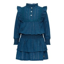 A long-sleeved, tiered denim dress in a deep blue color, featuring ruffled details and a high collar. The dress has a feminine, vintage-inspired style that would be suitable for a young girl.