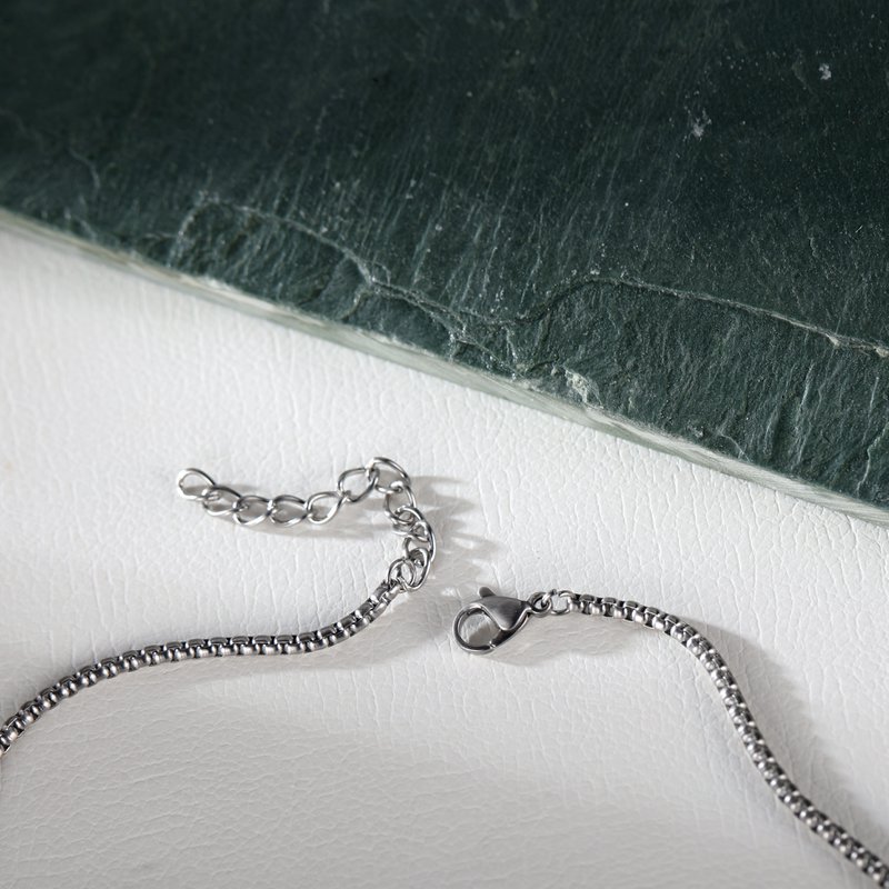 Collier à charme de guitare et corne