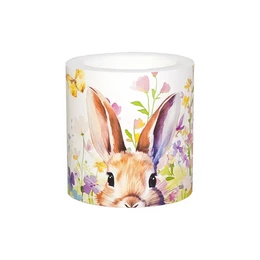 Decorative pillar candle with a whimsical illustration of a rabbit in a meadow. The candle is round, with a diameter of 75 mm, and features vibrant colors and a nature-inspired design.