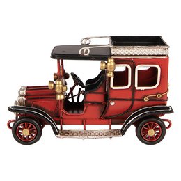 Red vintage metal car statue, antique automobile decoration, classic truck figurine.