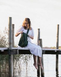  Forest green canvas shoulder bag with adjustable strap.