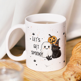 Boho-style mug with affirmation text "never stop dreaming" and floral print design. Ceramic material, suitable for hot beverages.