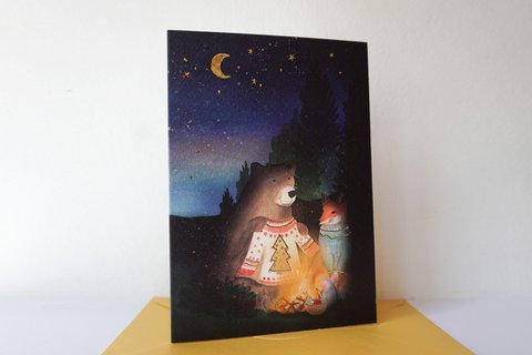 Christmas card with cheerful Christmas sweaters with foil printing