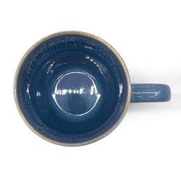 Stoneware mug with blue handle
