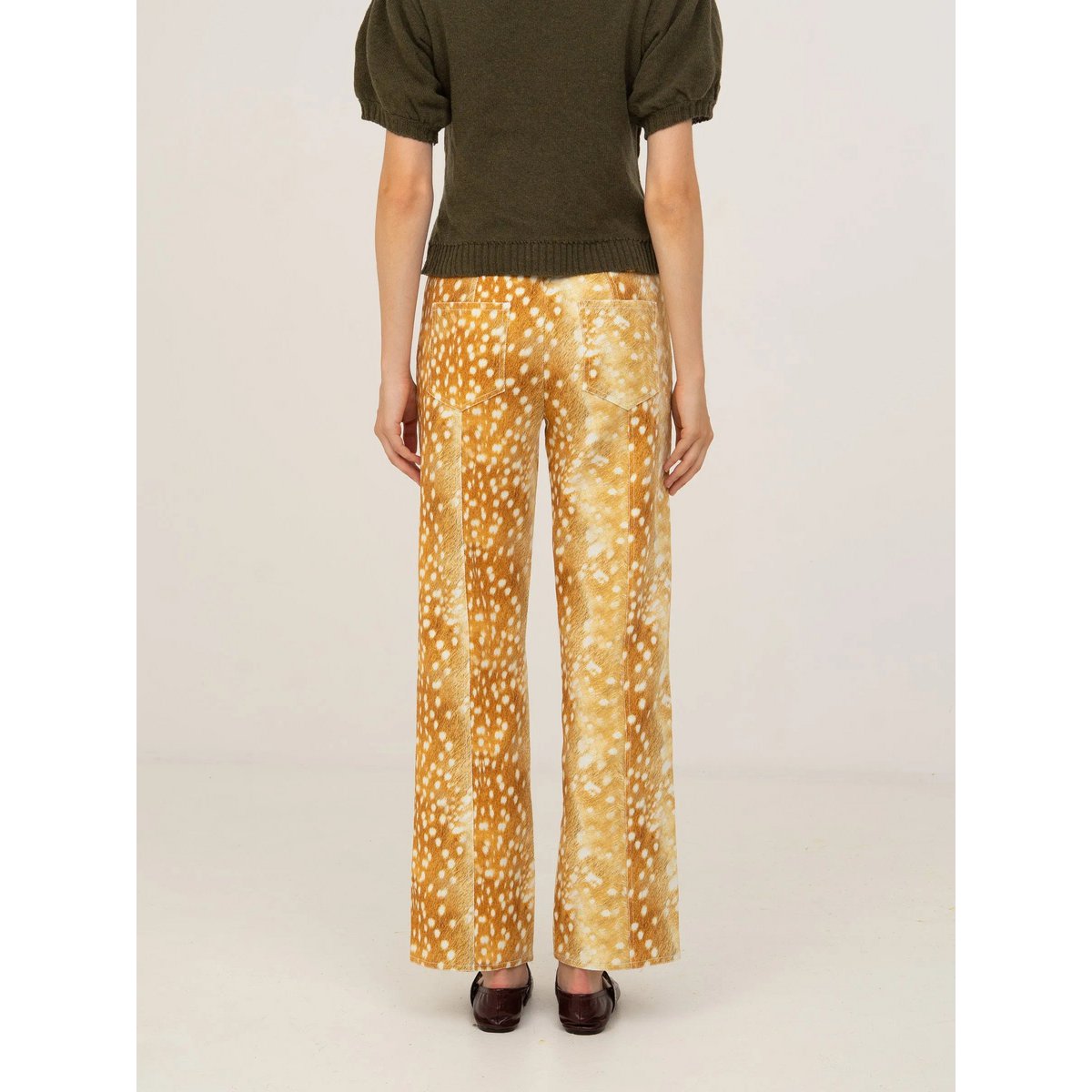 Jeans in denim con stampa cervo