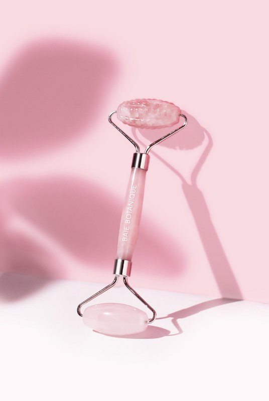 Rodillo de doble acción de cuarzo rosa