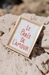 Paris in embroidered cotton frame