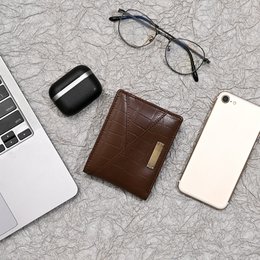  A premium brown croc-embossed napa leather wallet for men with a coin pocket and card slots.
