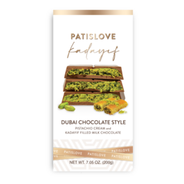 Pistachio and kadayif filled milk chocolate bar with a Dubai chocolate style. The chocolate bar features a layered design with a green filling and a milk chocolate exterior.