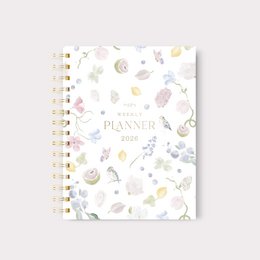  A5 spiral-bound planner with a floral and nature-inspired pattern, featuring a weekly layout for planning and organizing.