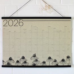 Annual planner 2024 made of grass paper with a wildflower meadow motif. Wall calendar with neutral tones and floral design.