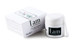 Organic Shea Butter cream in a white container with the text "I am" printed on it.