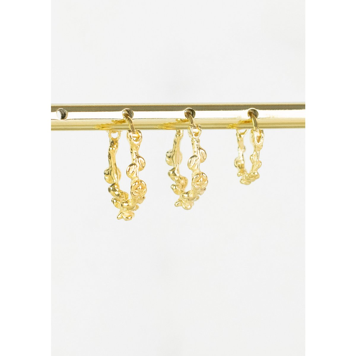 Pendiente rosey chapado en oro de 18k