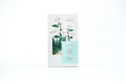 Green loose leaf tea with wild raspberry leaf, packaged in a paper box with a minimalist design.