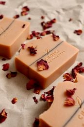 Natural, vegan, palm oil free soap with flower blossom scent and dried flower petals.