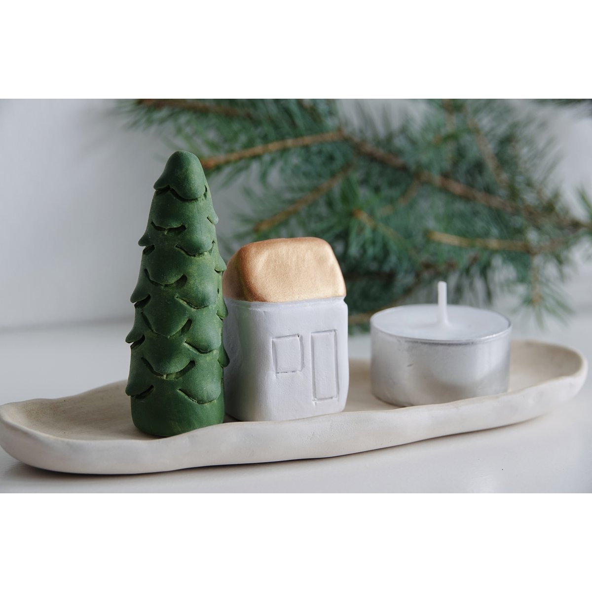 Christmas Giftbox with house, tree and candle