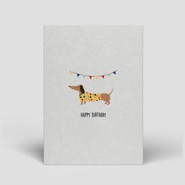 Colorful, eco-friendly birthday card with layered stripes in shades of blue, green, and orange.