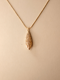 Gold-toned teardrop-shaped pendant necklace with textured surface.