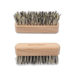 Beard brush made of beech wood with vegan bristles. Rectangular shape with wooden handle.