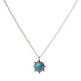 Turquoise sun pendant necklace with silver chain. Featuring a round turquoise stone in the center of a sun-shaped design with intricate detailing.