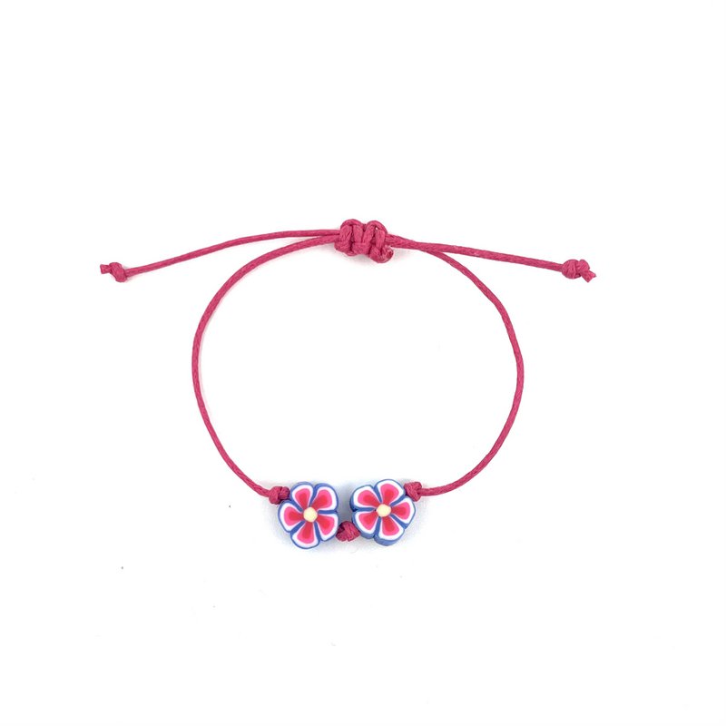 Luna-Leena Kinderarmband Blume lila – handgefertigt in Nepal