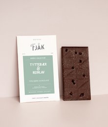 Dark chocolate bar with lingonberry and reindeer lichen, organic ingredients, rectangular shape.
