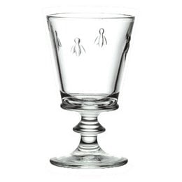 Set of 6 clear glass wine glasses with bee motif, suitable for serving wine.