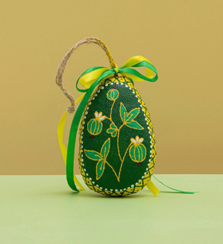 Small green Easter Egg with berries
