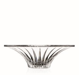 A low, round decorative bowl made of clear glass with a timeless, elegant design featuring a flared, fan-shaped profile.