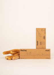 Mini-sized relief image depicting the Madrid skyline, featuring architectural elements and landmarks.