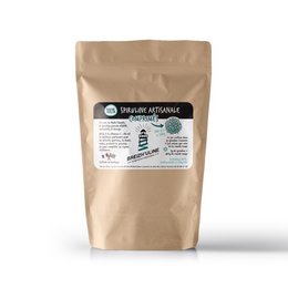 Spirulina tablets, a dietary supplement containing the nutrient-rich blue-green algae spirulina. The tablets are packaged in a brown paper bag.
