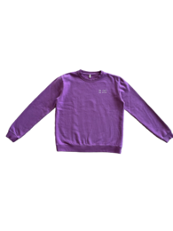 Purple women's sweatshirt with "Be cool be wild" text on the front.