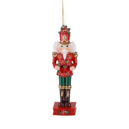  A red and green nutcracker ornament with a wreath around its head, measuring 10.5 cm in diameter.