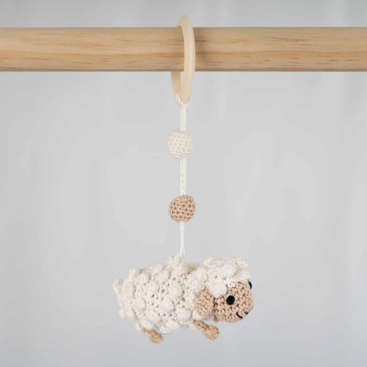 Crocheted play arch pendant sheep DOLLY in white