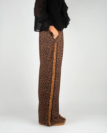 Pantaloni fluidi da donna con stampa leopardata marrone