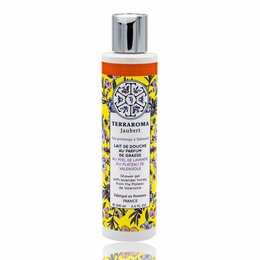 Honey-infused shower milk with floral accents, featuring a creamy, moisturizing formula.