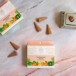 Natural incense cones with no charcoal, designed to enhance mood. Conical shape, natural materials, and long-lasting fragrance.