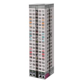 A tall, multi-story building with a grid-like pattern of windows and balconies, suggesting a modern apartment or office complex.