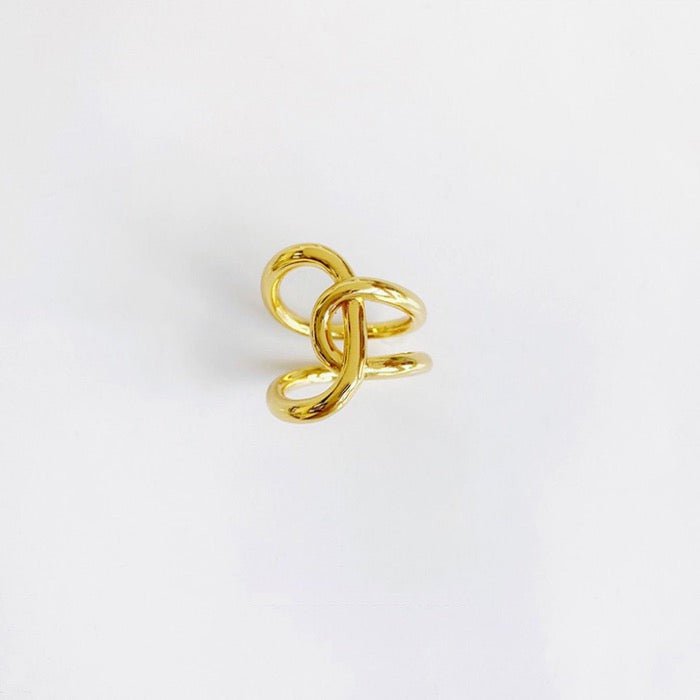 Bague croisée à design fluide géométrique
