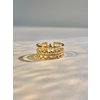 Bague motif étoile centrale ajourée réglable en acier