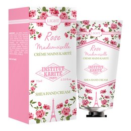 Rose-scented hand cream with shea butter, in a floral-patterned packaging.