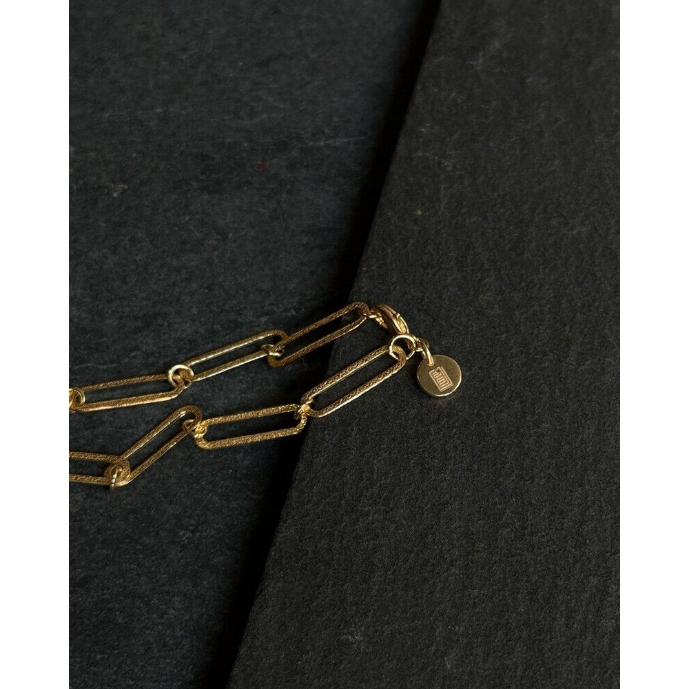 Pulsera de cadena de eslabones con moneda de oro