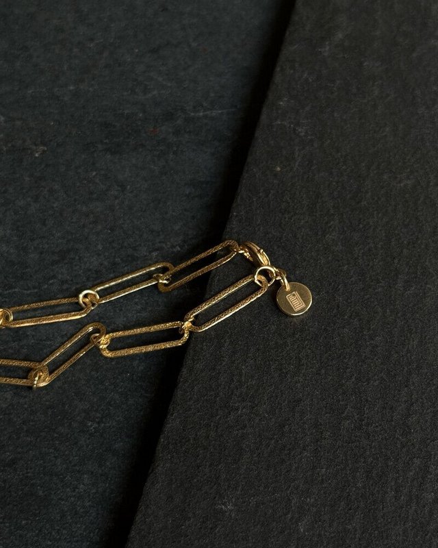 Pulsera de cadena de eslabones con moneda de oro