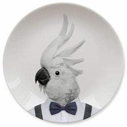 "Decorative plate featuring a cockatoo wearing a bow tie, suitable for kids' dinnerware. The plate has a round shape and a monochrome design with the cockatoo image."