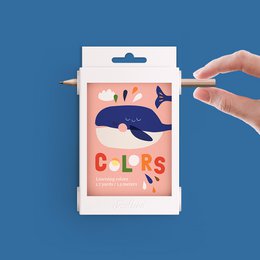 Colorful educational toy with whimsical whale design. Teaches colors through interactive play.