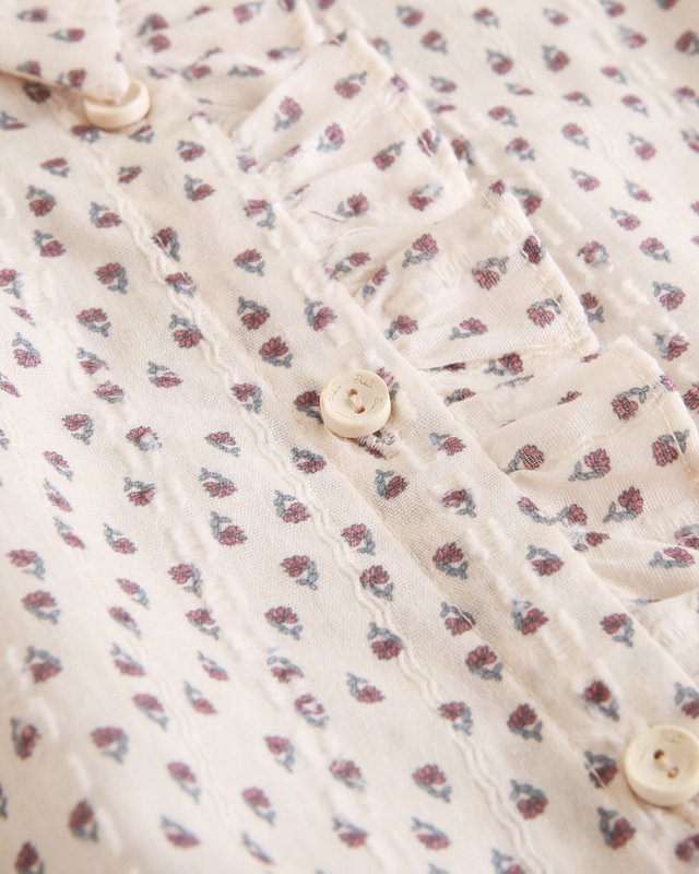 Blomsterbluse til piger med tekstur og sløjfe ved halsen P79-11604155