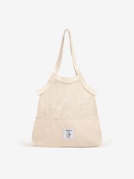 Beige canvas tote bag with a simple, minimalist design and a small logo patch.