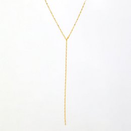 Gold and silver Y-shaped necklace with delicate chain.