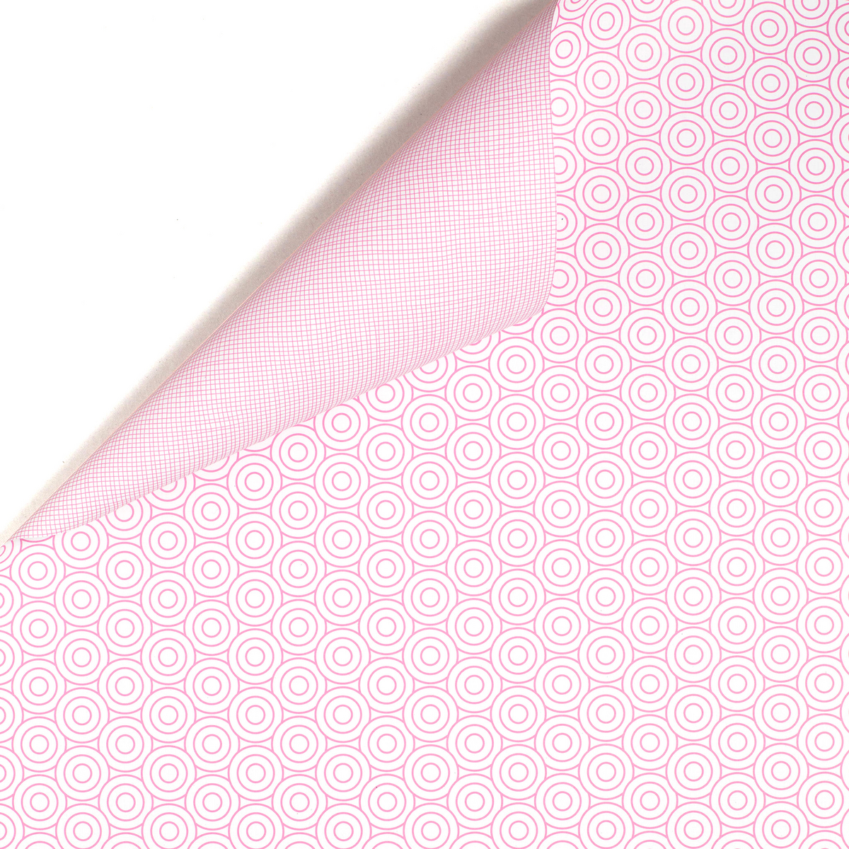 Papier d'emballage rose géométriquement avec des cercles, du papier d'emballage graphique en rose tendre pour des cadeaux de naissance, du baptême ou comme papier d'emballage pour l'anniversaire des enfants