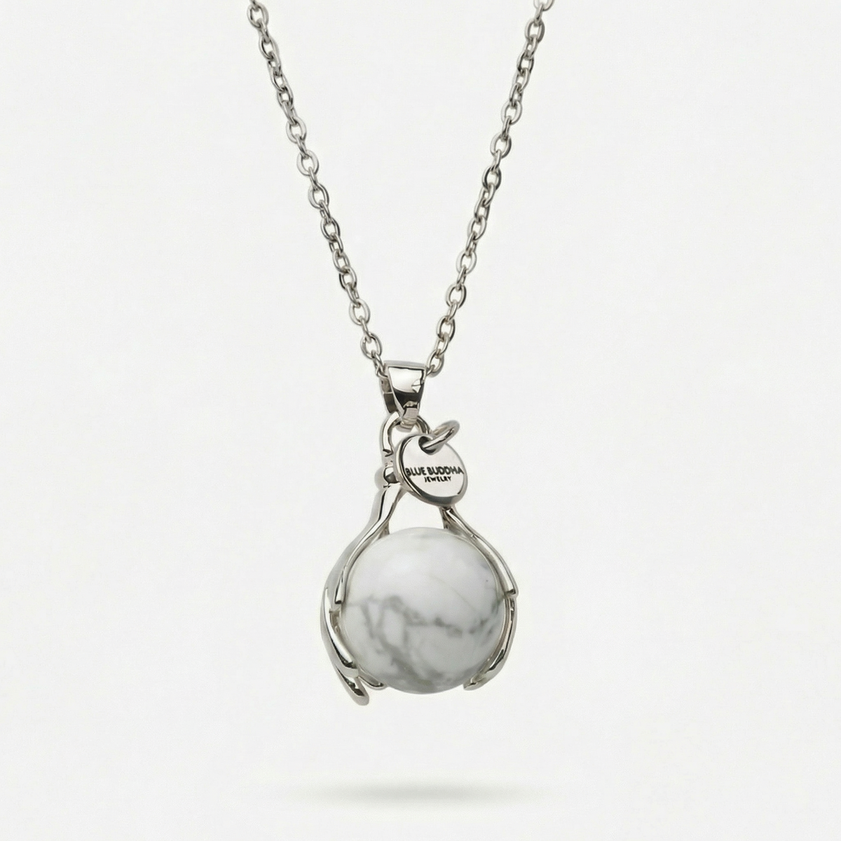 Howlite omfavner halskæde sølv